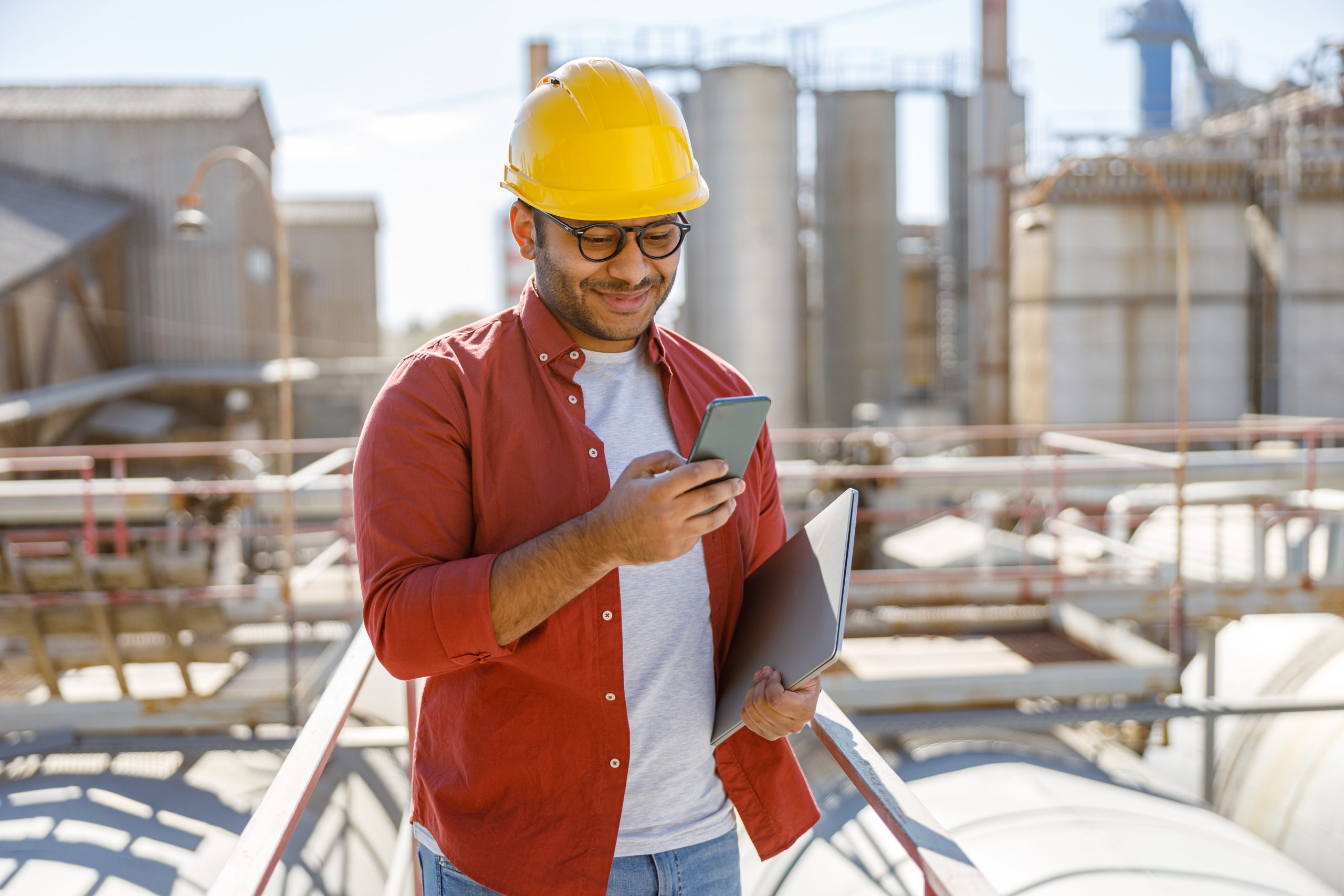 Industrial worker on his job at heavy industry plant